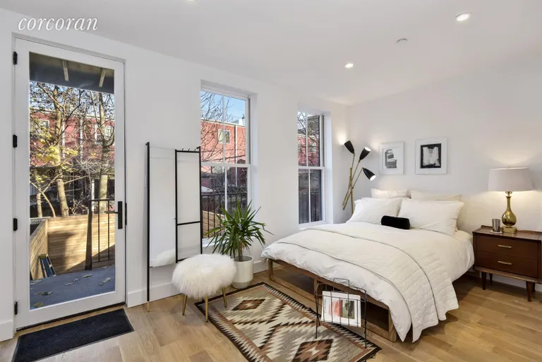 New York City Real Estate | View 23 North Elliott Place, 2 | Bedroom with Deck & Upper Rear Yard Access | View 4