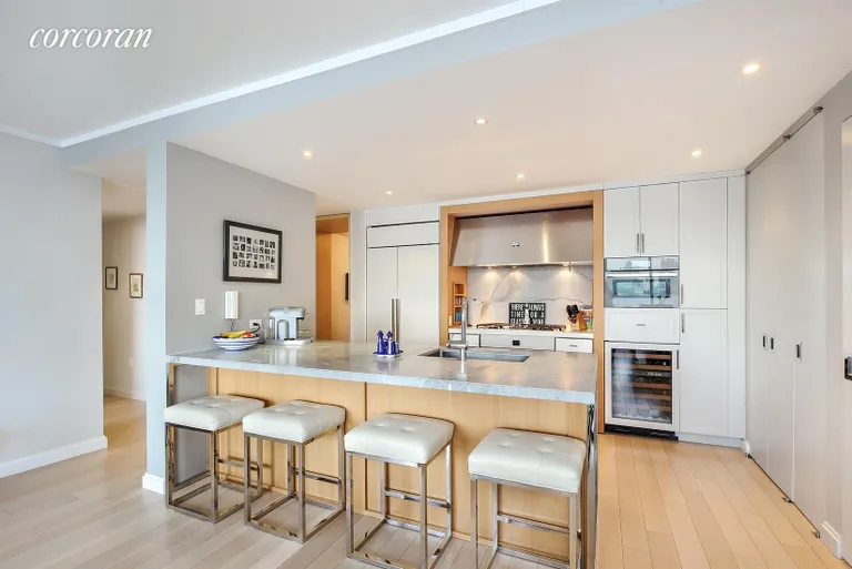 New York City Real Estate | View 212 Warren Street, 5G | Chef's Open Kitchen with Breakfast Bar | View 2