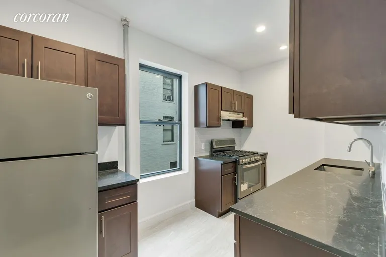 New York City Real Estate | View 22-06 38th Street, 2F | 2 Beds, 1 Bath | View 1