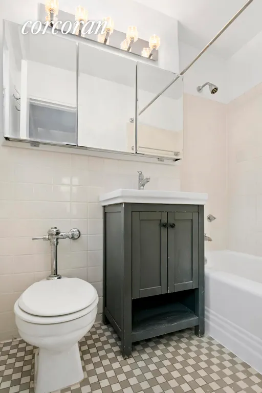 New York City Real Estate | View 140 East 56th Street, 12F | One of two Bathroom w/window in Master BA | View 6