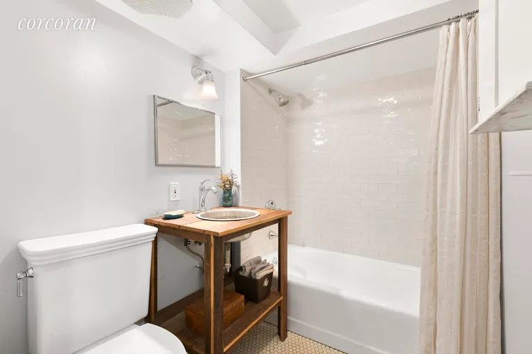 New York City Real Estate | View 138 Broadway, 1C | Renovated bathroom | View 6