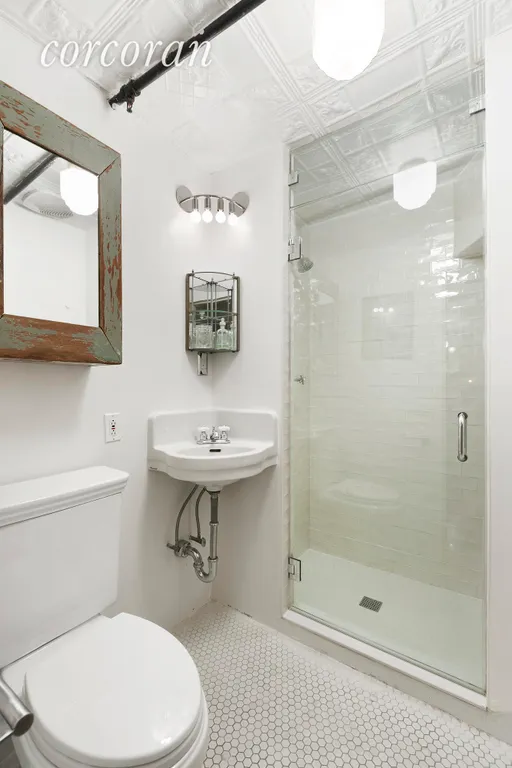 New York City Real Estate | View 138 Broadway, 1C | Renovated bathroom | View 9