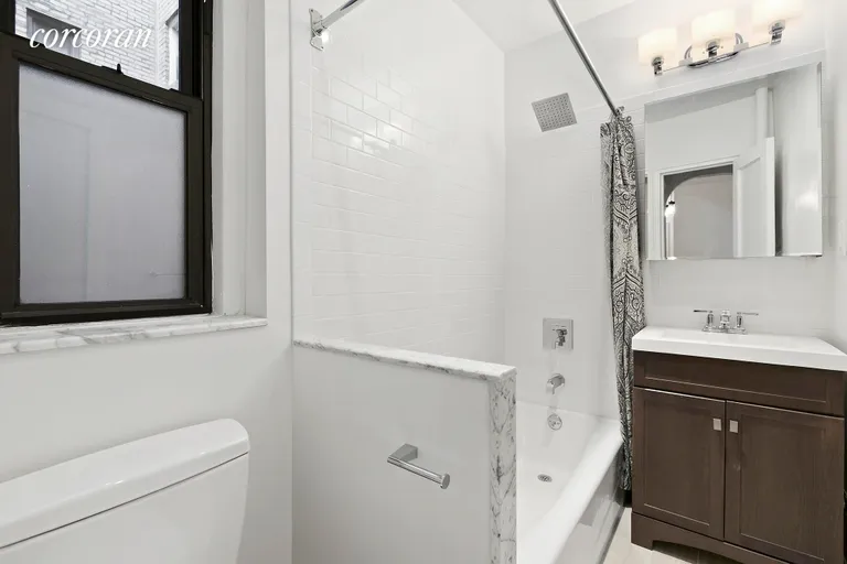 New York City Real Estate | View 225 West 25th Street, 4C | New Marble Bath | View 2