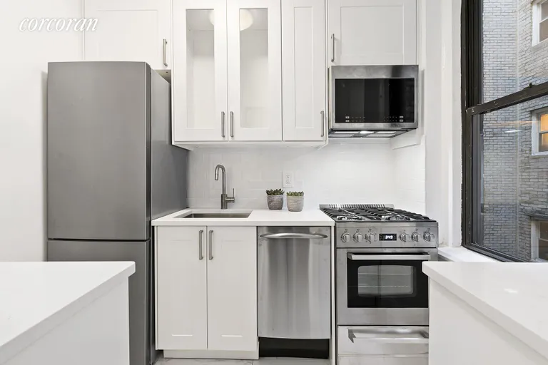 New York City Real Estate | View 225 West 25th Street, 4C | Separate Windowed Kitchen | View 3