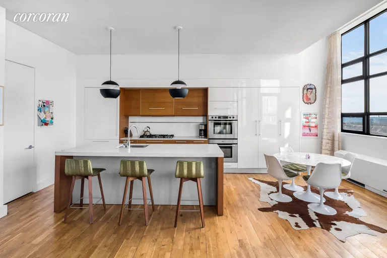 New York City Real Estate | View 360 Furman Street, 206 | Expanded kitchen with casual dining area | View 4