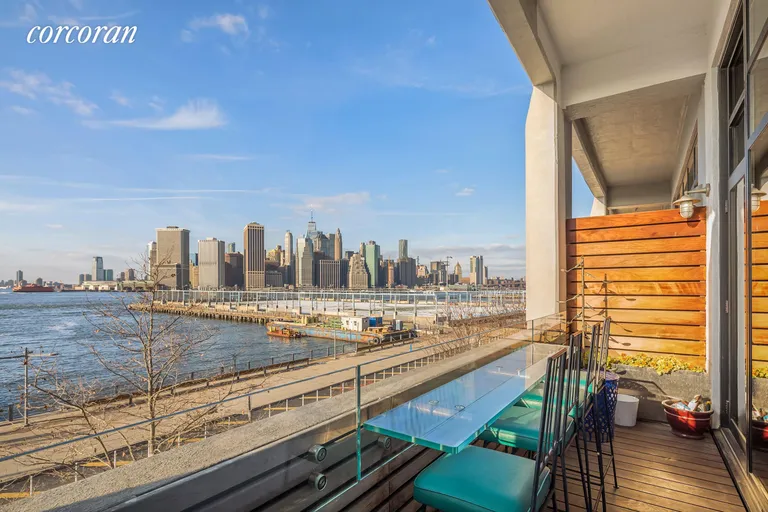 New York City Real Estate | View 360 Furman Street, 206 | Terrace off living room with custom built bar  | View 5
