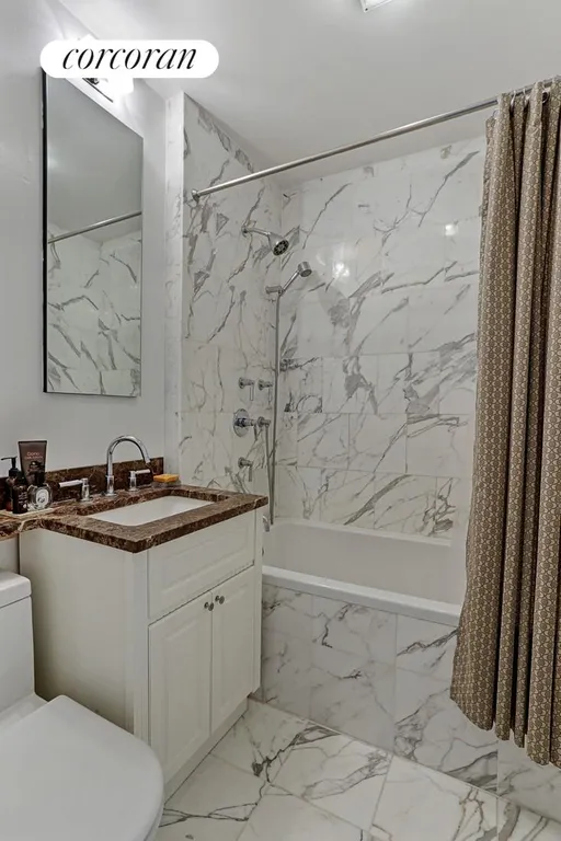 New York City Real Estate | View 132 State Street, 3A | Crisp bathroom w/ deep, soaking tub | View 5
