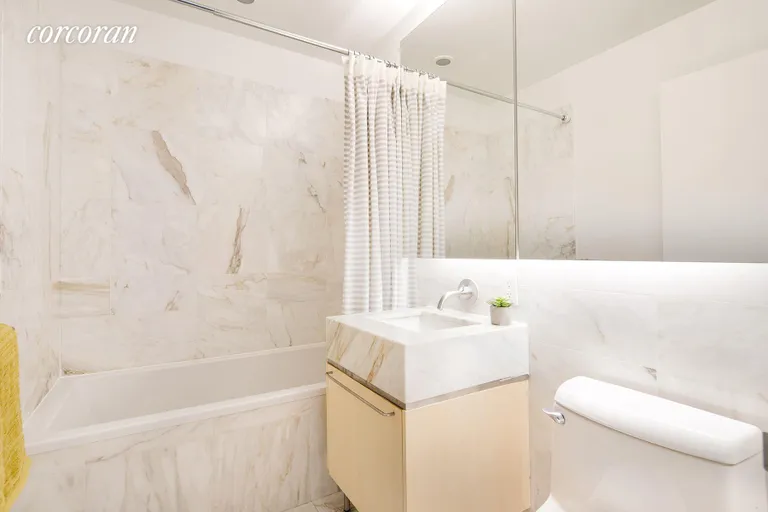 New York City Real Estate | View 200 Chambers Street, 5T | Marble bathroom with Zuma soaking tub | View 4