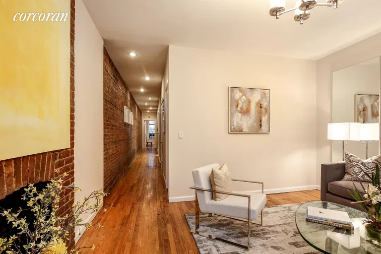 New York City Real Estate | View 438 West 47th Street, 2A | Living Room/Hallway Leading to Master Bedroom | View 2