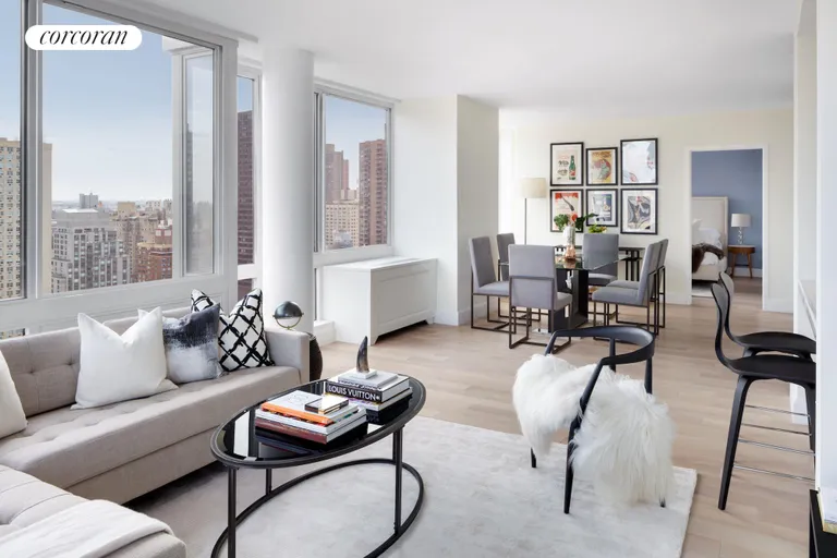 New York City Real Estate | View 389 East 89th Street, 27C | Living room w/ Northeast views | View 2
