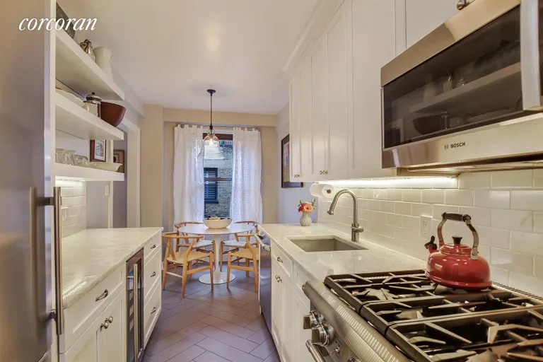 New York City Real Estate | View 205 East 78th Street, 20A | Windowed kitchen with top of the line appliances | View 3