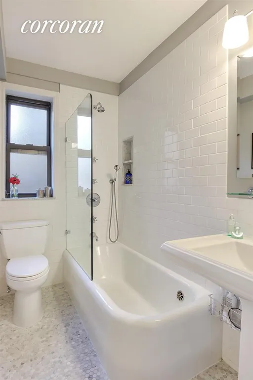 New York City Real Estate | View 205 East 78th Street, 20A | Windowed bath | View 6