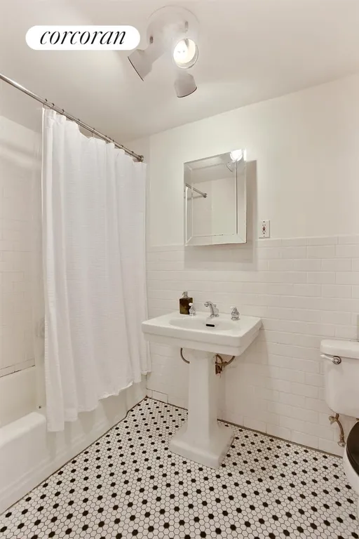 New York City Real Estate | View 403 Clermont Avenue | Garden Apt Bathroom | View 15
