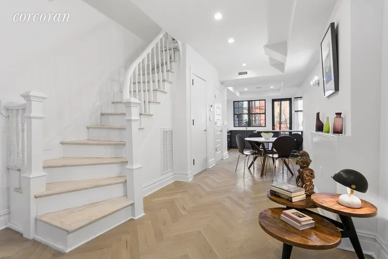 New York City Real Estate | View 89 Maujer Street | Curved banister leading up to bedrooms | View 3