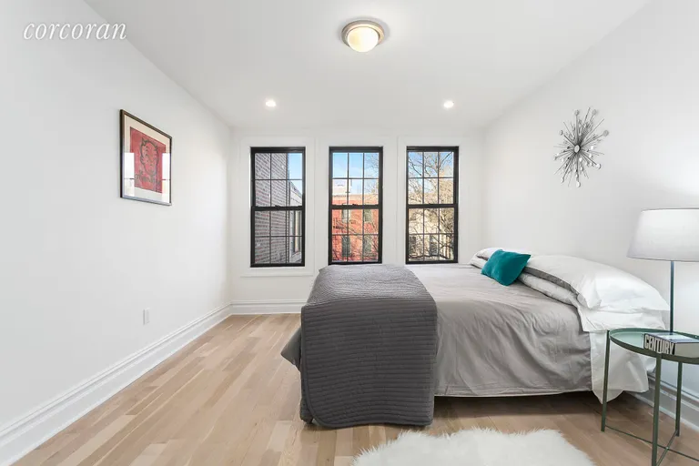 New York City Real Estate | View 89 Maujer Street | Master bedroom facing beautiful brownstones | View 6