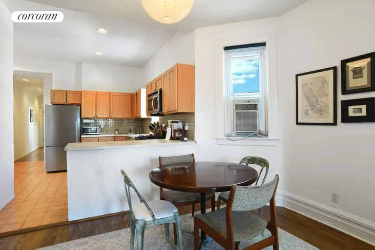 New York City Real Estate | View 64 7th Avenue, Top Floor | Renovated, Open Kitchen w/ Dining Area | View 2