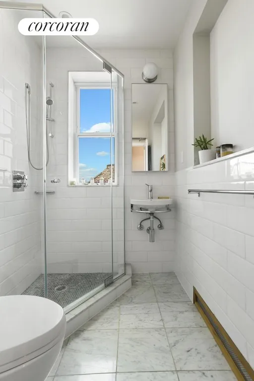 New York City Real Estate | View 64 7th Avenue, Top Floor | Crisp Hall Bathroom | View 5