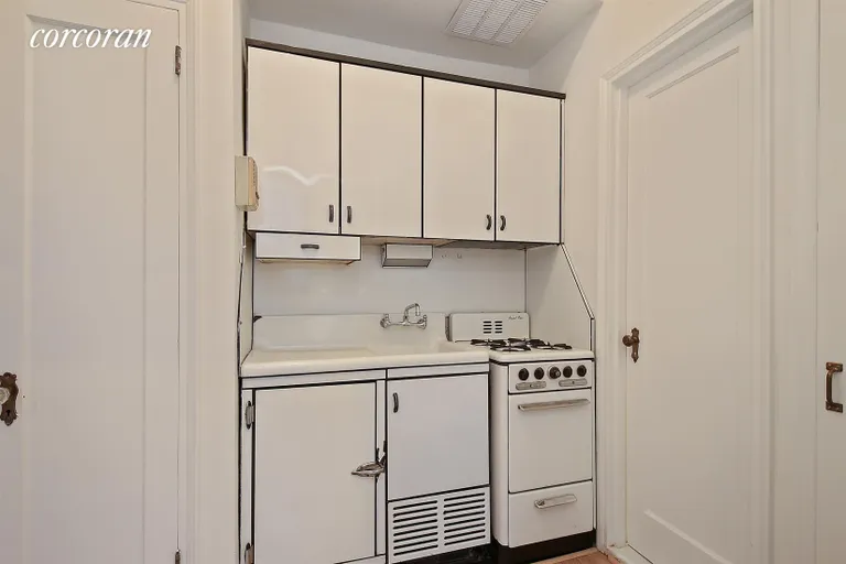 New York City Real Estate | View 131 East 15th Street, 2C | Under sink fridge with potential to reconfigure | View 3