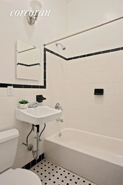New York City Real Estate | View 131 East 15th Street, 2C | Original tiles with soaking tub | View 4