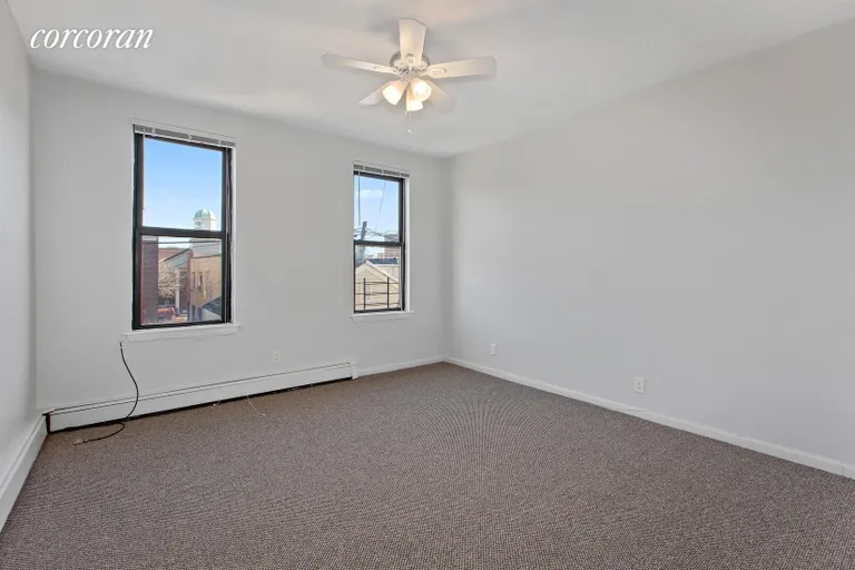 New York City Real Estate | View 41-19 57th Street, 1st floor | Bedroom | View 3