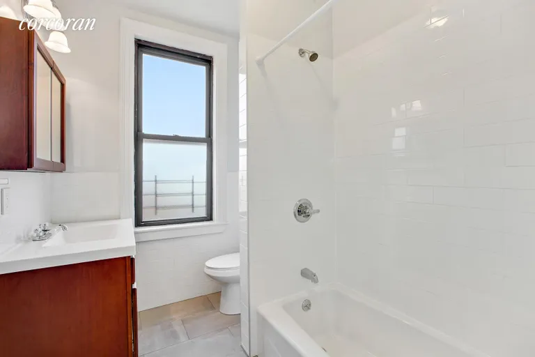 New York City Real Estate | View 41-19 57th Street, 1st floor | Bathroom | View 2