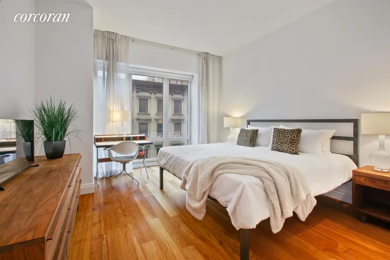 New York City Real Estate | View 33 West 56th Street, 6C | Sunny Master Bedroom with En-Suite Bath | View 3