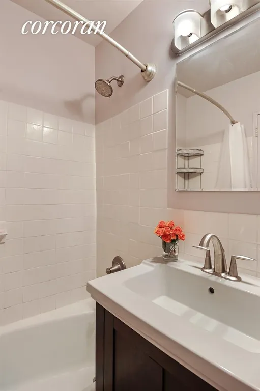 New York City Real Estate | View 399 East 72Nd Street, 9C | Recently-renovated bath with Kohler fixtures | View 5