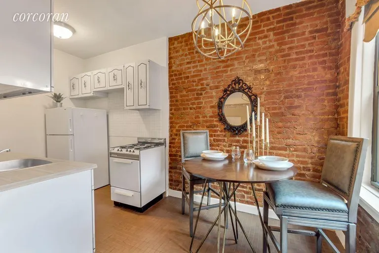 New York City Real Estate | View 230 East 71st Street, 6A | Beautiful exposed double brick wall  | View 4