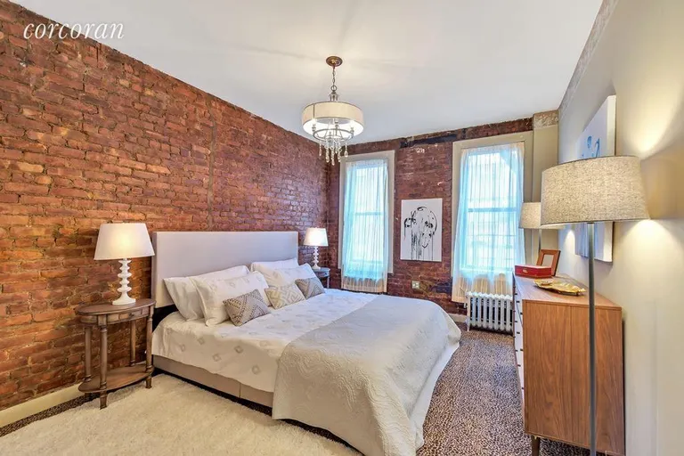 New York City Real Estate | View 230 East 71st Street, 6A | Lovely prewar details exposed double brick wall | View 6