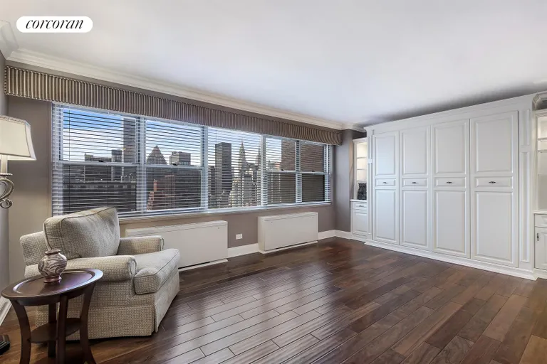 New York City Real Estate | View 400 East 56th Street, 30A | Spacious Living Area w/Murphy Bed | View 2