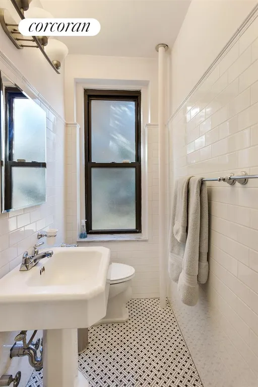 New York City Real Estate | View 415 Ocean Parkway, 1G | Crisp, renovated en suite bath | View 5