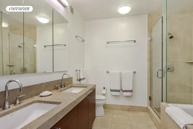 New York City Real Estate | View 30 West Street, 23A | Primary Bathroom | View 16