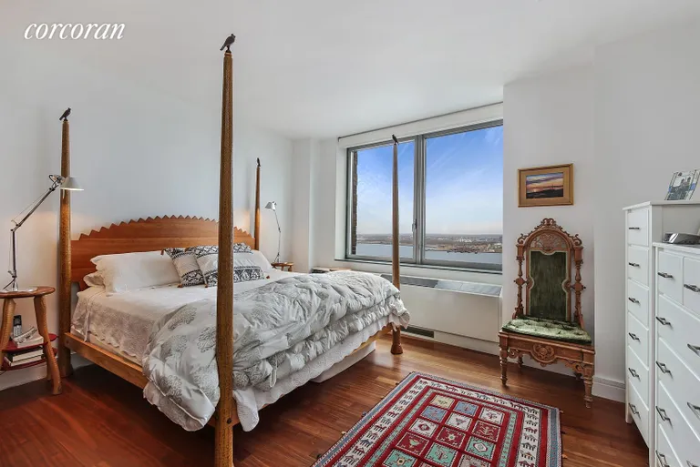 New York City Real Estate | View 30 West Street, 23A | Master Bedroom with Direct Hudson River Views | View 6