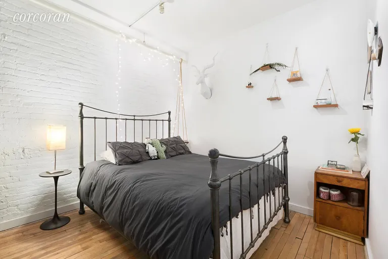 New York City Real Estate | View 95 Lexington Avenue, 4B | Quiet bedroom with exposed brick | View 6