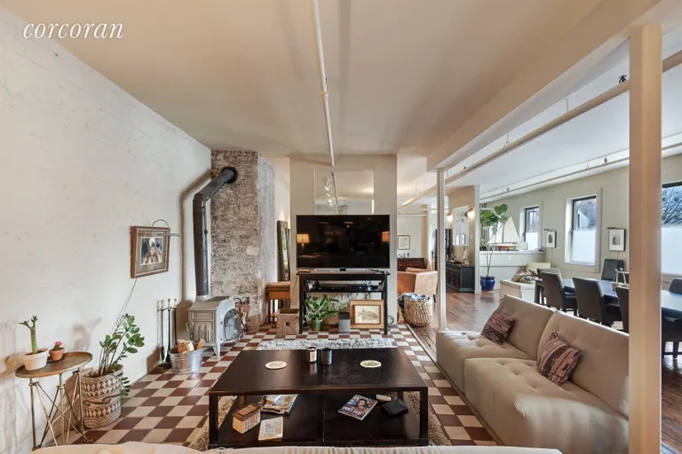 New York City Real Estate | View 604 Driggs Avenue, Loft | Living Room | View 2