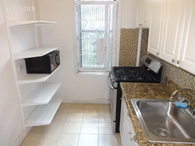 New York City Real Estate | View 756 Brady Avenue, 507 | Kitchen with window | View 5