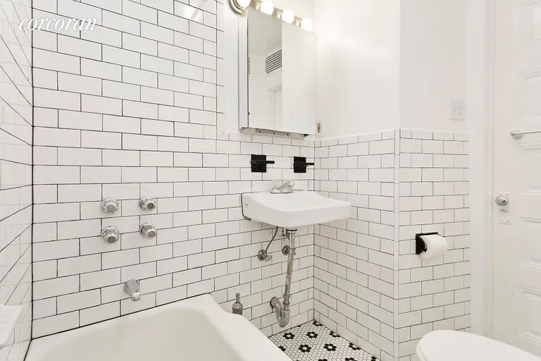 New York City Real Estate | View 345 Gates Avenue, 1 | Stunning bathroom with chic tiles  | View 6