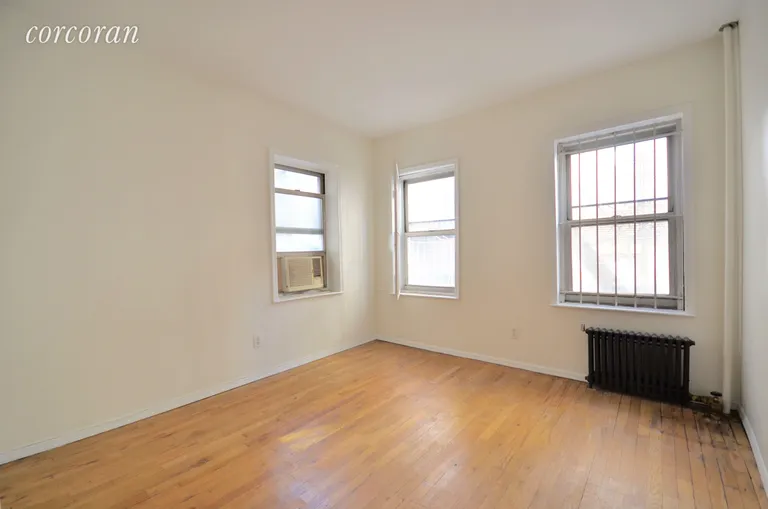 New York City Real Estate | View 427 East 6th Street, 3R | Large bedroom overlooking the garden | View 3