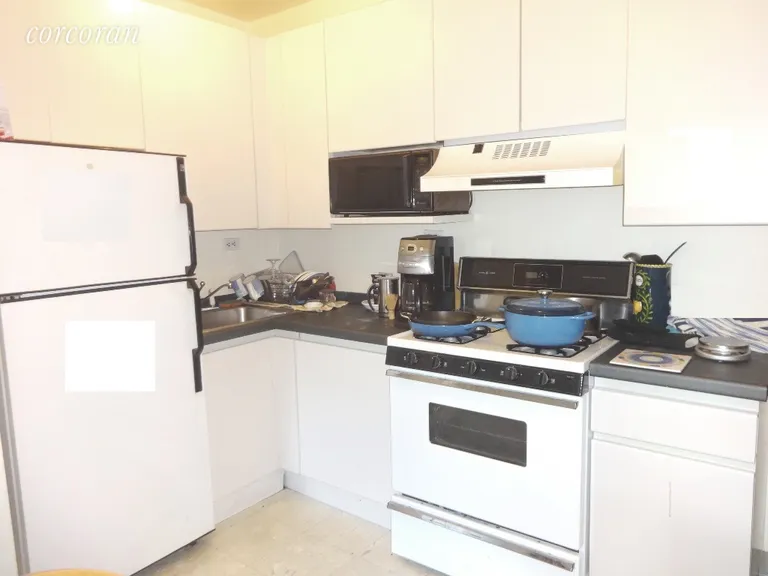 New York City Real Estate | View 175 Willoughby Street, 10E | Kitchen with full size appliances | View 3