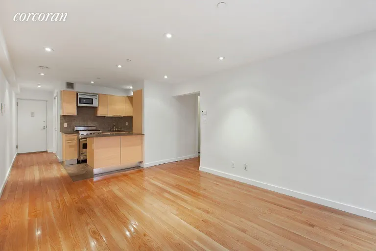 New York City Real Estate | View 215 East 81st Street, 2A | Open Kitchen with Breakfast Bar | View 8