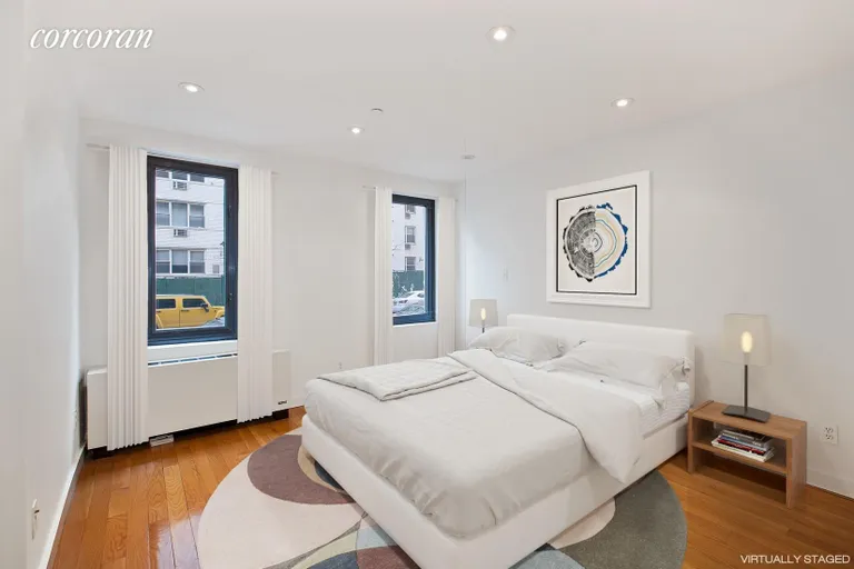 New York City Real Estate | View 215 East 81st Street, 2A | Bright Bedroom Fits King-Sized Bed  | View 4