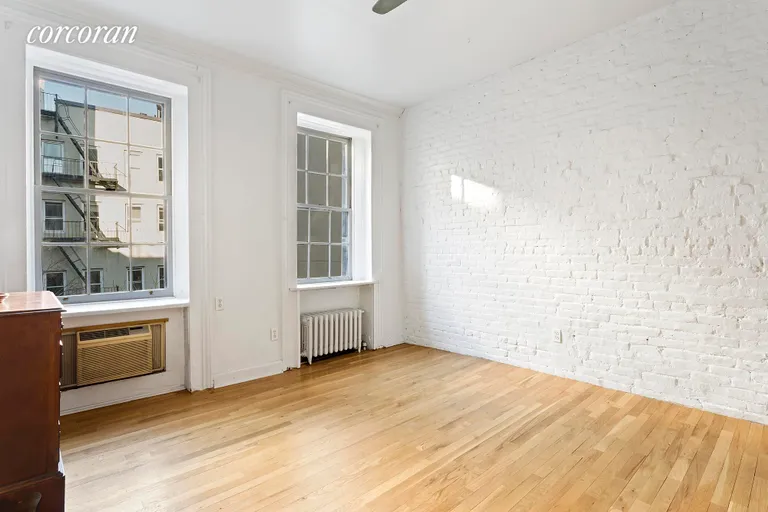 New York City Real Estate | View 325 East 9th Street, 3 | Bright bedroom overlooking 2 gardens | View 4