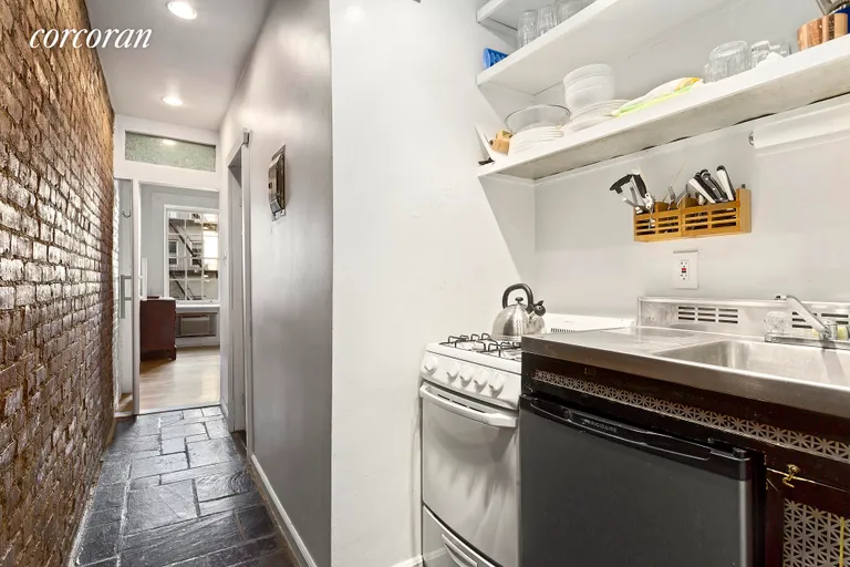 New York City Real Estate | View 325 East 9th Street, 3 | Corridor pullman kitchen and bathroom | View 3