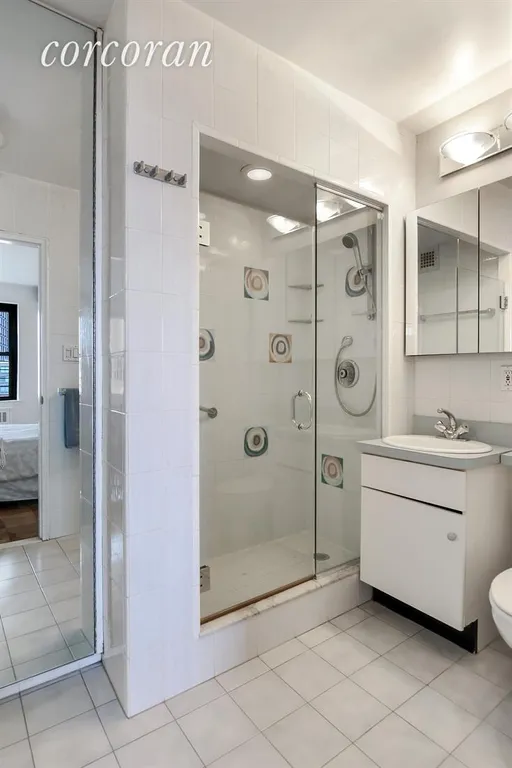 New York City Real Estate | View 185 West End Avenue, 18A | Bathroom with shower stall | View 7