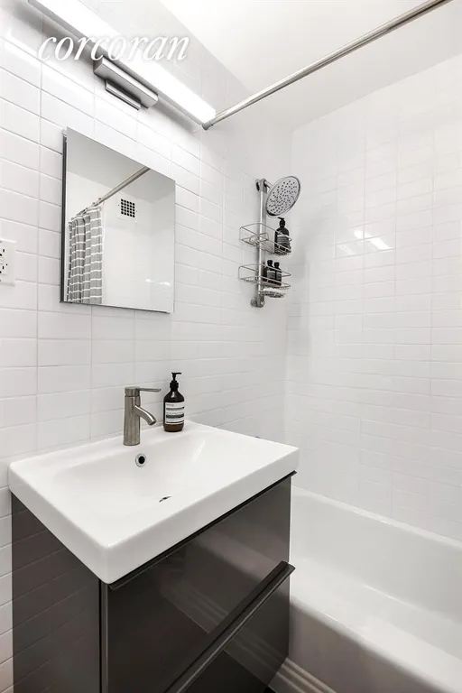 New York City Real Estate | View 333 East 14th Street, 14M | Modern Bathroom | View 4