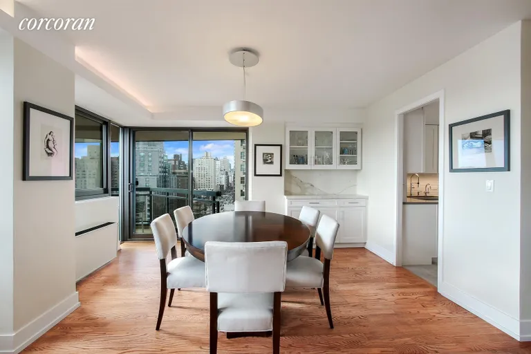 New York City Real Estate | View 1725 York Avenue, 18F | Dining Room with a View | View 4