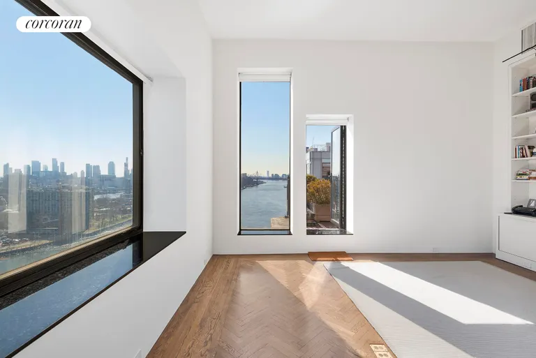 New York City Real Estate | View 10 Gracie Square, PHS | Library | View 4