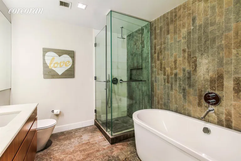 New York City Real Estate | View 447 West 18th Street, Townhouse 1 | Gorgeous Master Bathroom | View 6