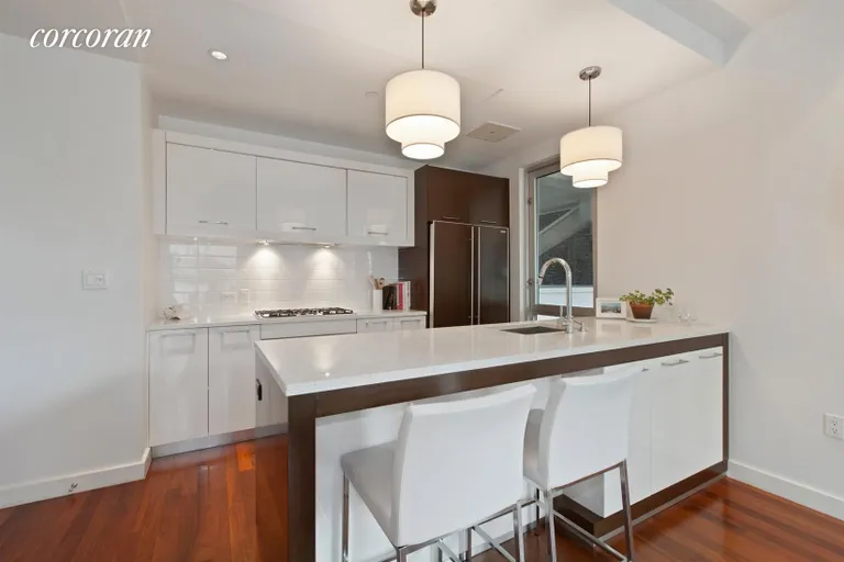 New York City Real Estate | View 125 North 10th Street, S5D | Windowed Kitchen with Breakfast Bar | View 2