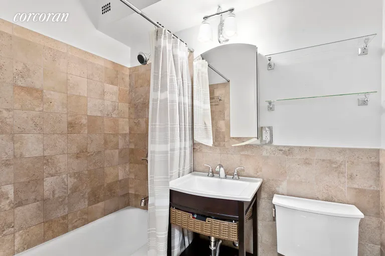 New York City Real Estate | View 175 West 12th Street, 14F | Updated bathroom with tub/shower | View 4